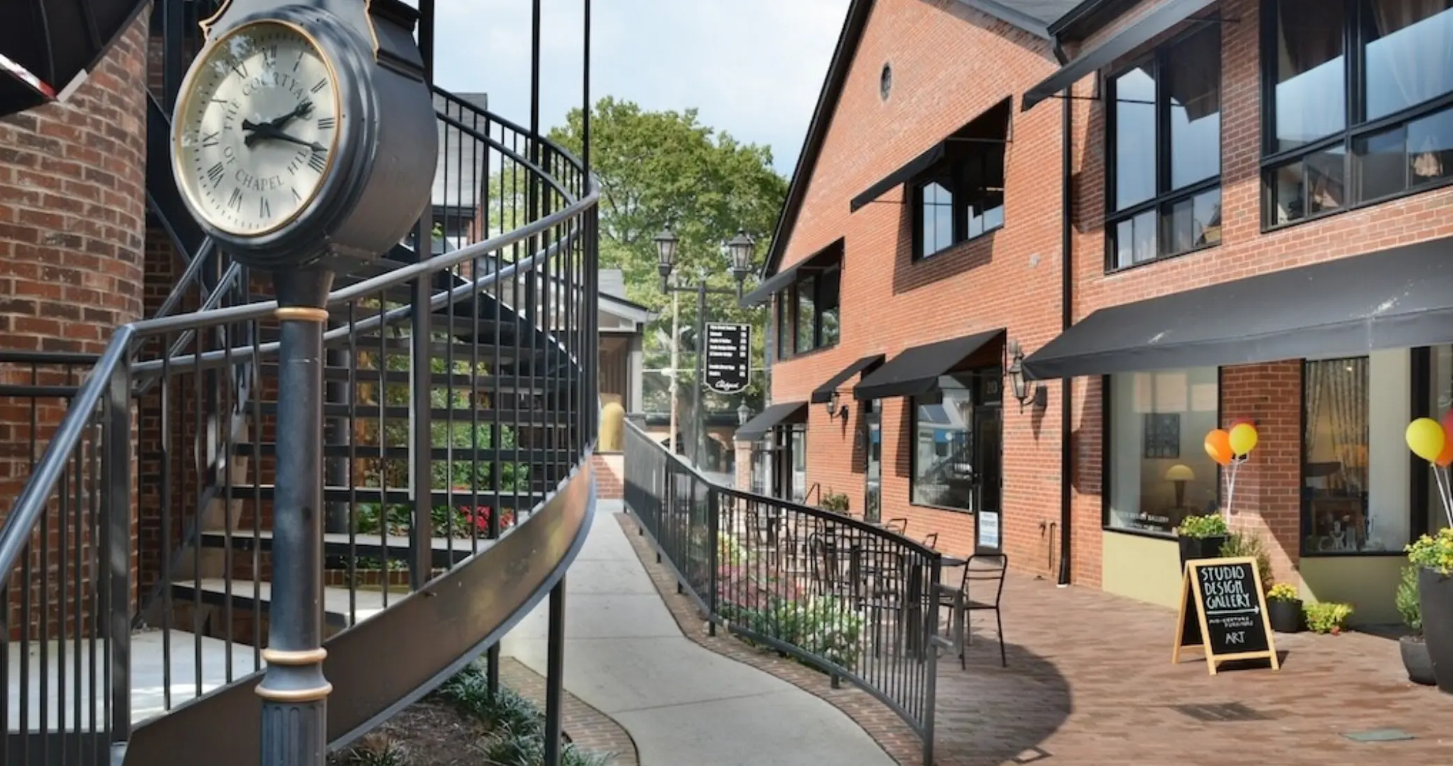 Exterior view of The Courtyard compound on West Franklin Street, the home of Flow Pilates